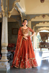 Orange rangoli silk lehenga choli