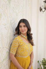 Luxury Designer Yellow Gown for Women - High-Quality Faux Blooming Fabric with Zari Thread & Sequins EmbroideryLuxury Designer Gown for Women - High-Quality Faux Blooming Fabric with Zari Thread & Sequins Embroidery.