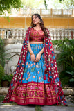Firozi Tussar Silk Pichwai & Patola Print Lehenga Choli