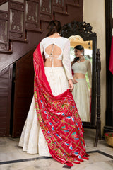 Of White Color Lucknowi Lehenga with Paper Mirror Work