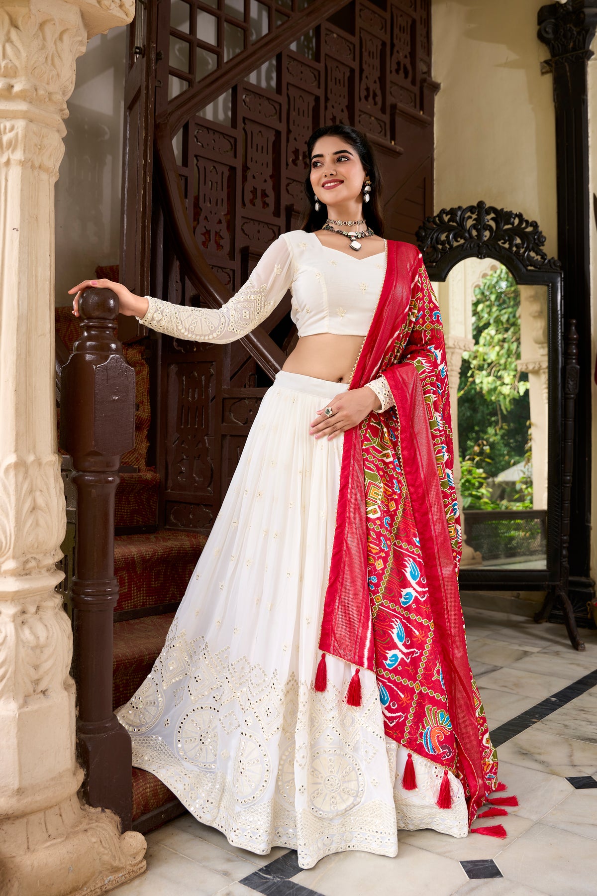 Of White Color Lucknowi Lehenga with Paper Mirror Work