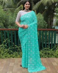 Elegant Aqua Green Moss Chiffon Saree with Foil Print – Perfect for Festivals and Weddings | Imported Silk Blouse Included.