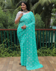 Elegant Aqua Green Moss Chiffon Saree with Foil Print – Perfect for Festivals and Weddings | Imported Silk Blouse Included.