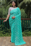 Elegant Aqua Green Moss Chiffon Saree with Foil Print – Perfect for Festivals and Weddings | Imported Silk Blouse Included.