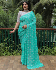 Elegant Aqua Green Moss Chiffon Saree with Foil Print – Perfect for Festivals and Weddings | Imported Silk Blouse Included.