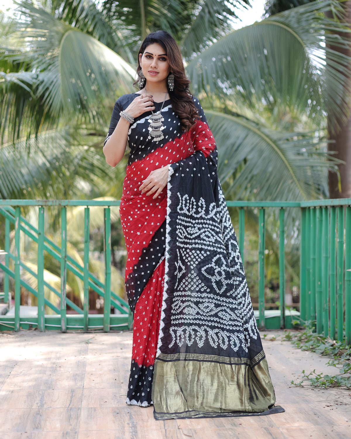 Premium Black Pure Bandhej Silk Saree with Zari Weaving, Rich Tissue Pallu & Unstitched Blouse Piece.