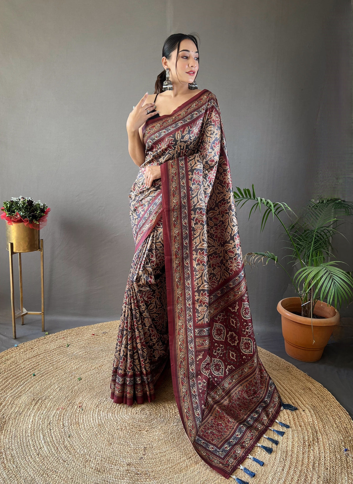 Black Digital Print Semi Silk Saree with Soft Weaves, Elegant Pallu & Border, Tassels, and Unstitched Blouse Piece.