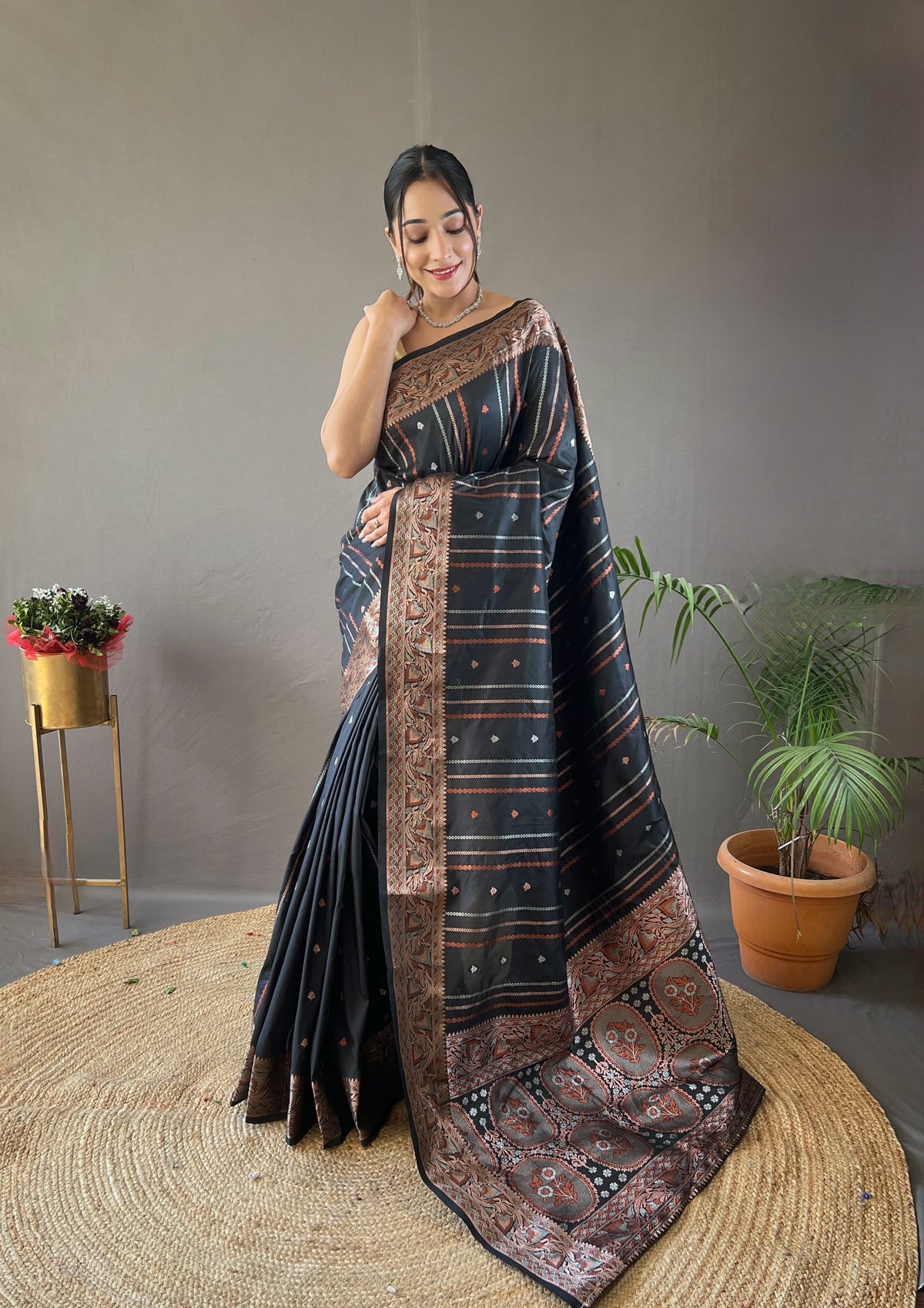 Elegantly Black Woven Silk Saree with Silver, Copper, and Antique Detailing: Jacquard Border and All-Over Zari Lining with Unstitched Blouse Piece