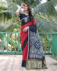 Premium Black Pure Bandhej Silk Saree with Zari Weaving, Rich Tissue Pallu & Unstitched Blouse Piece.