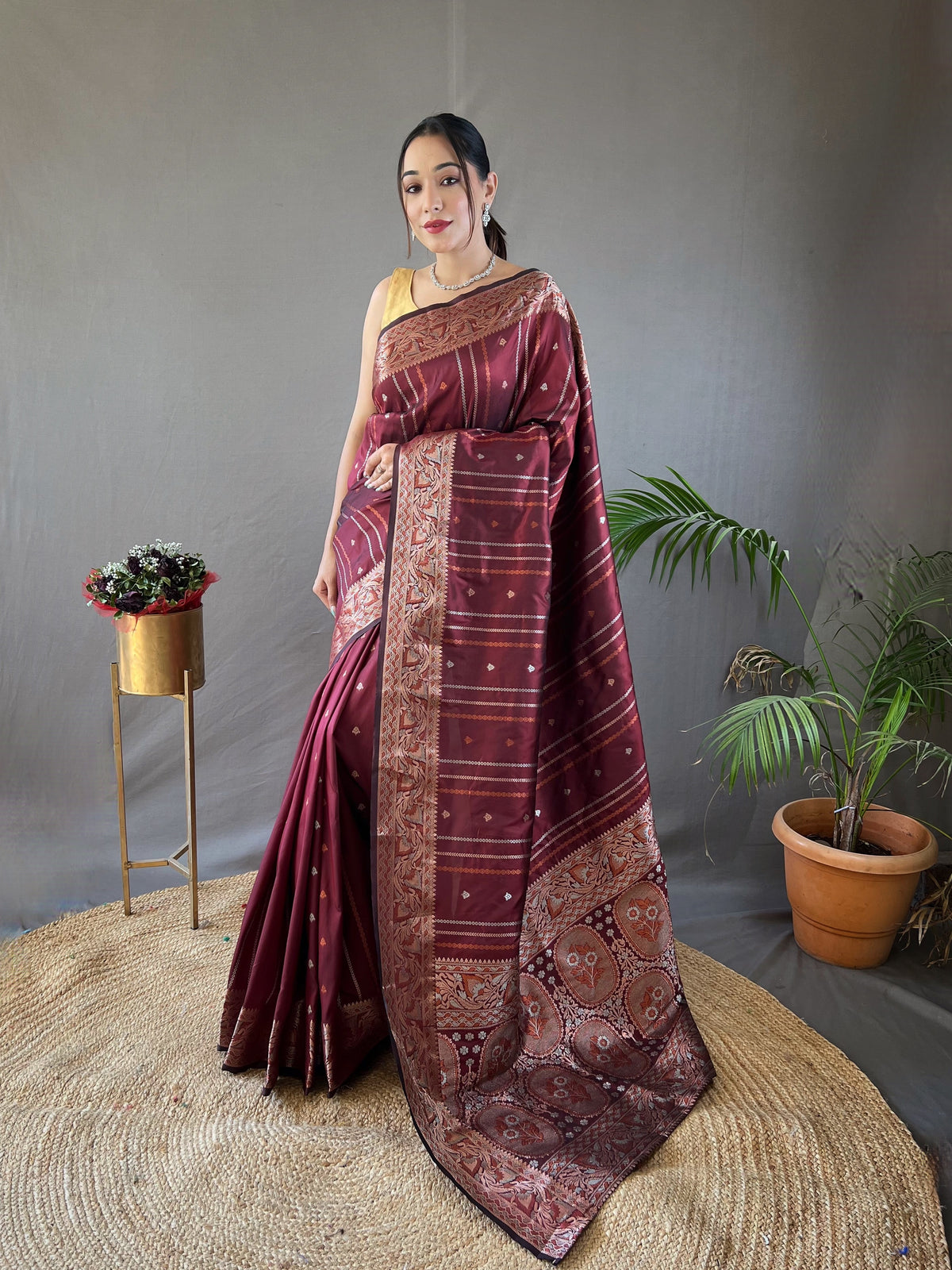 Elegantly Brown Woven Silk Saree with Silver, Copper, and Antique Detailing: Jacquard Border and All-Over Zari Lining with Unstitched Blouse Piece.