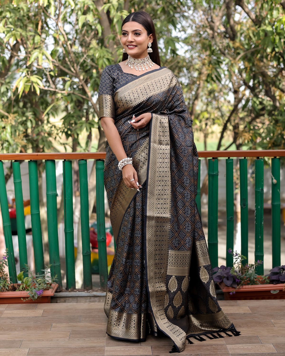 Exquisite Black Pure Silk Bandhej Patola Sarees Featuring Rich Zari Weaving and Contrasting Borders With Unstitched Blouse Piece.