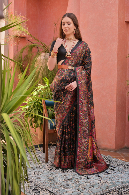 Luxurious Black Extra Soft Pashmina Silk Saree with Vibrant Kashmiri Jal Weaving Pattern and Elegant Tassels.