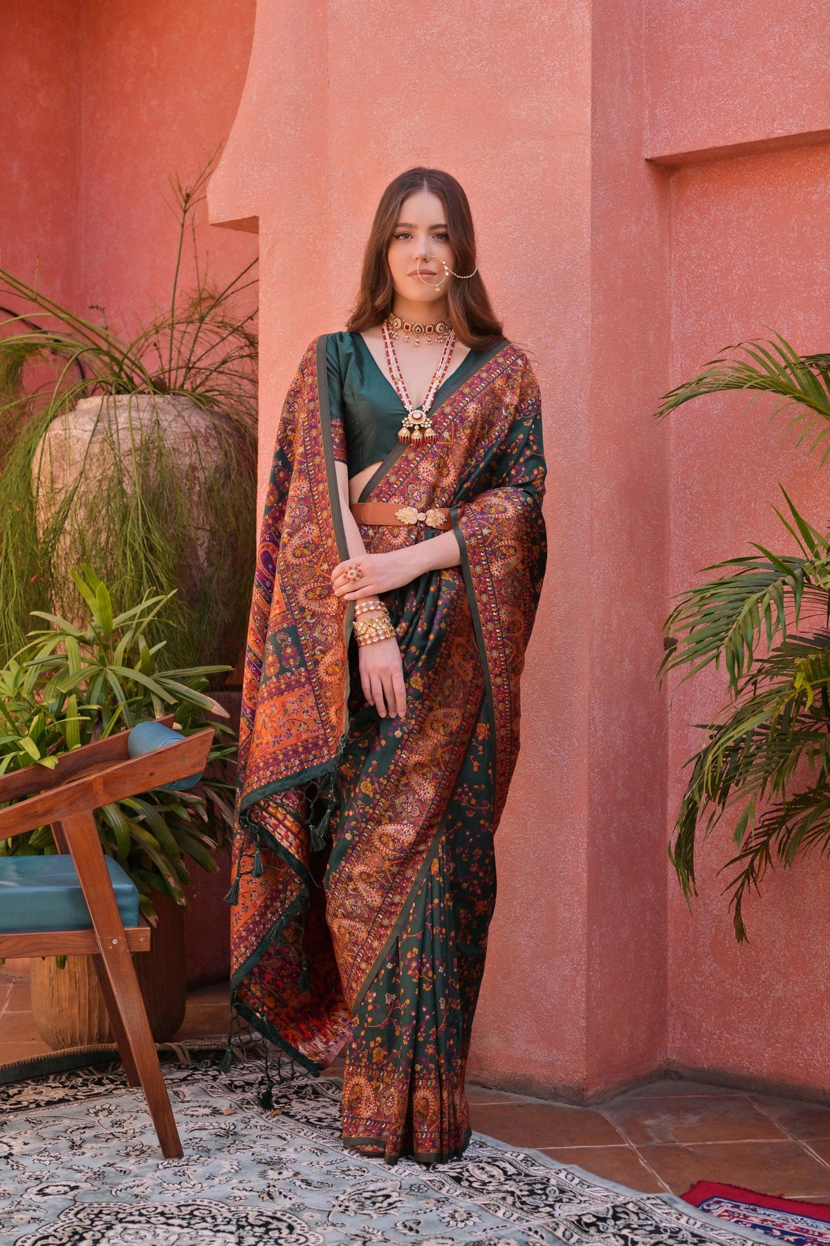 Luxurious Dark Green Extra Soft Pashmina Silk Saree with Vibrant Kashmiri Jal Weaving Pattern and Elegant Tassels.