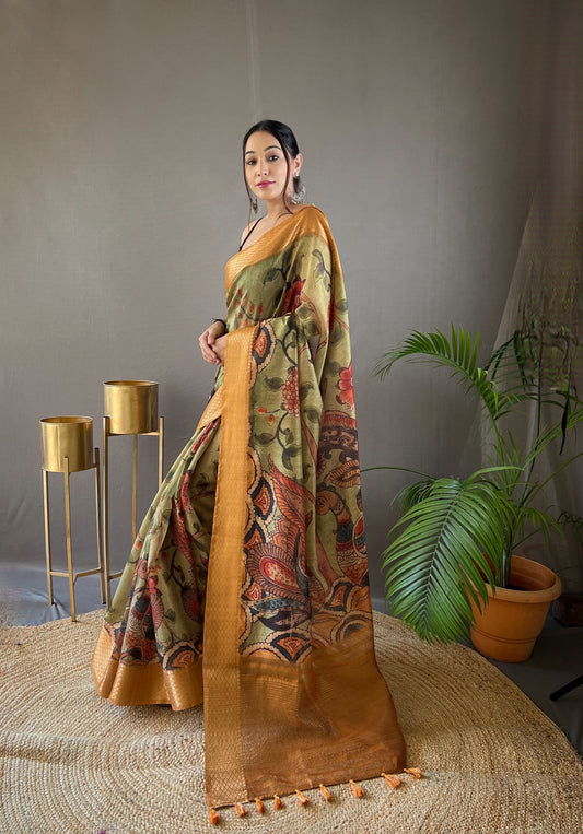 Pure Gold Tussar Silk Saree with Handpainted Kalamkari Print, Contrast Zari Weaving Border, Zari Woven Pallu, and Coordinated Contrast Printed Blouse.