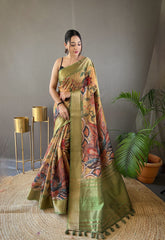 Pure Green Tussar Silk Saree with Handpainted Kalamkari Print, Contrast Zari Weaving Border, Zari Woven Pallu, and Coordinated Contrast Printed Blouse.