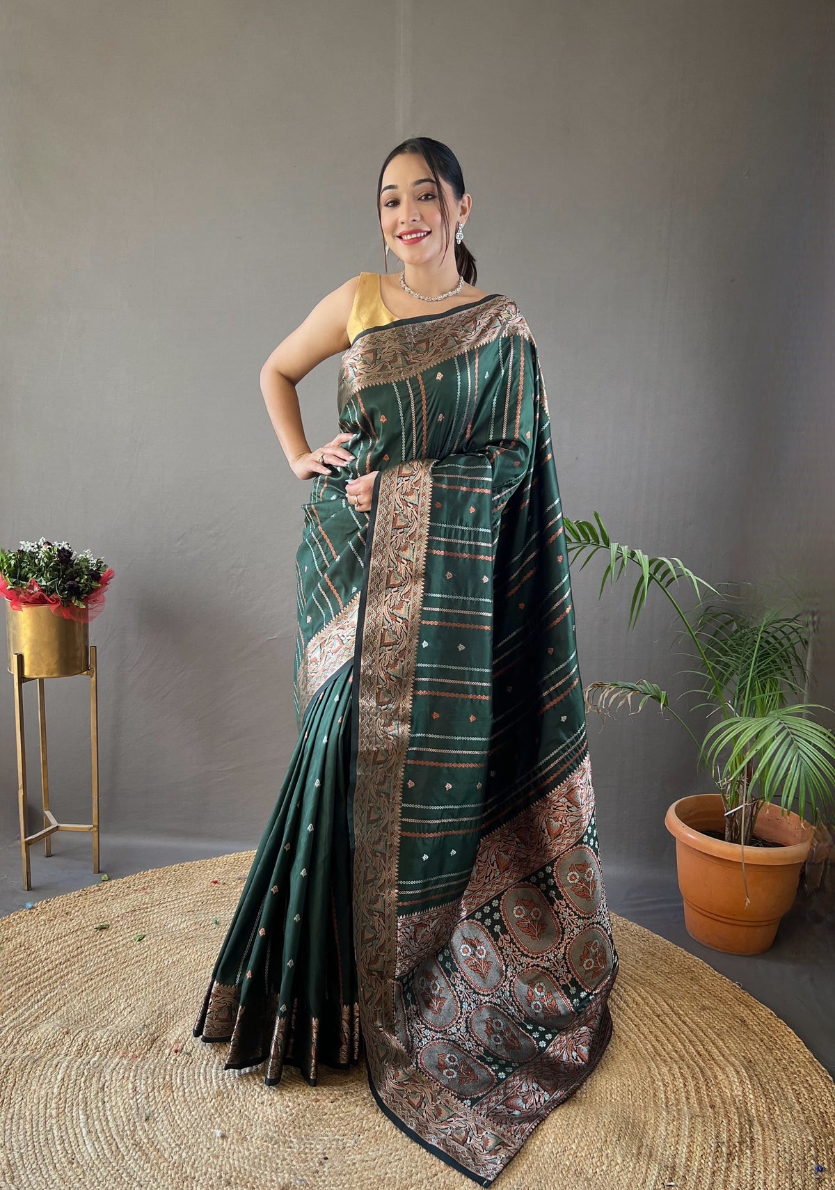 Elegantly Green Color  Woven Silk Saree with Silver, Copper, and Antique Detailing: Jacquard Border and All-Over Zari Lining with Unstitched Blouse Piece.