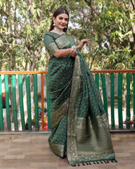 Luxury Handloom Green Silk Bandhej Patola Sarees with Kanchi Borders and Unstitched Blouse Piece.