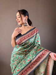 Green Digital Print Semi Silk Saree with Soft Weaves, Elegant Pallu & Border, Tassels, and Unstitched Blouse Piece.