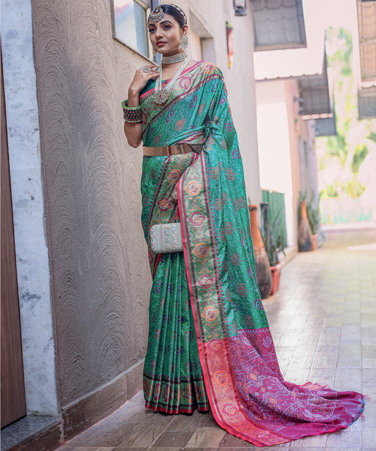 Elegant Green Patola Silk Saree with Meenakari Weaving, Rich Pallu & Contrast Brocade Fancy Unstitched Blouse | Premium Silk Saree Collection.