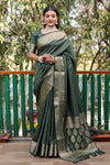 Exquisite Green Pure Silk Bandhej Patola Sarees Featuring Rich Zari Weaving and Contrasting Borders With Unstitched Blouse Piece.