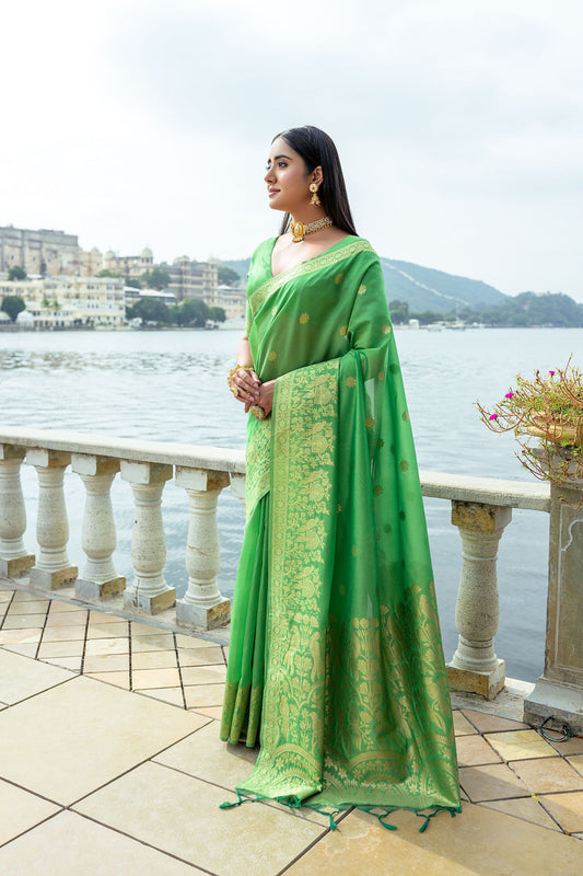 Premium Green Soft Silk Saree with Fine Zari Weaving Border, Butti Design, and Rich Zari Pallu.