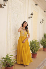 Luxury Designer Yellow Gown for Women - High-Quality Faux Blooming Fabric with Zari Thread & Sequins EmbroideryLuxury Designer Gown for Women - High-Quality Faux Blooming Fabric with Zari Thread & Sequins Embroidery.