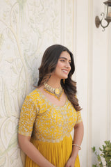 Luxury Designer Yellow Gown for Women - High-Quality Faux Blooming Fabric with Zari Thread & Sequins EmbroideryLuxury Designer Gown for Women - High-Quality Faux Blooming Fabric with Zari Thread & Sequins Embroidery.