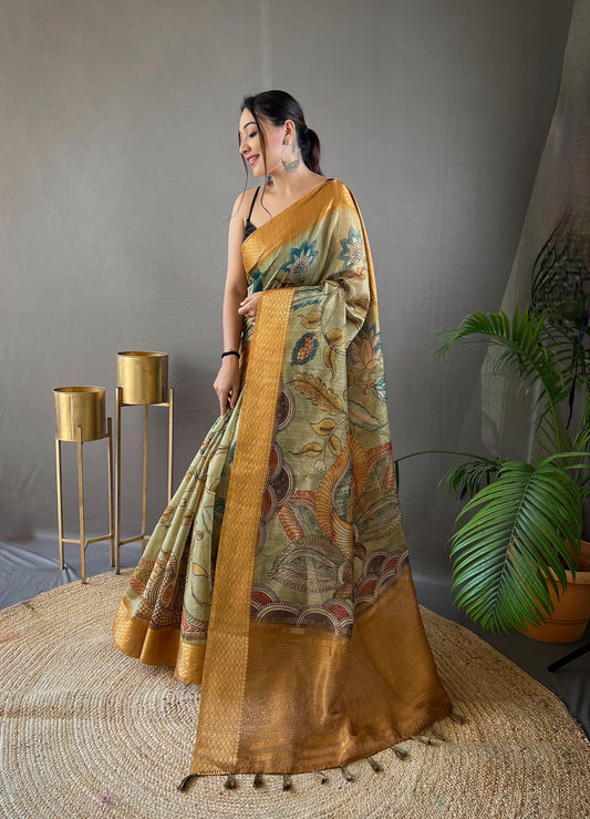 Pure Orange Tussar Silk Saree with Elegant Handpainted Kalamkari Print, Contrast Zari Weaving Border, and Zari Woven Pallu - Paired with Contrast Printed Blouse.