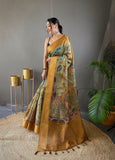 Pure Orange Tussar Silk Saree with Elegant Handpainted Kalamkari Print, Contrast Zari Weaving Border, and Zari Woven Pallu - Paired with Contrast Printed Blouse.