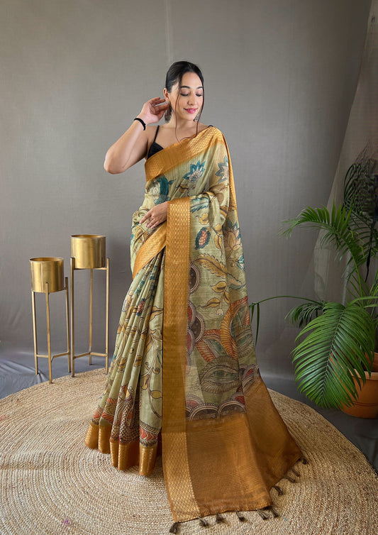 Pure Orange Tussar Silk Saree with Elegant Handpainted Kalamkari Print, Contrast Zari Weaving Border, and Zari Woven Pallu - Paired with Contrast Printed Blouse.