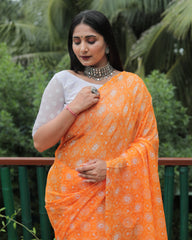 Elegant Orange Moss Chiffon Saree with Foil Print – Perfect for Festivals and Weddings | Imported Silk Blouse Included.