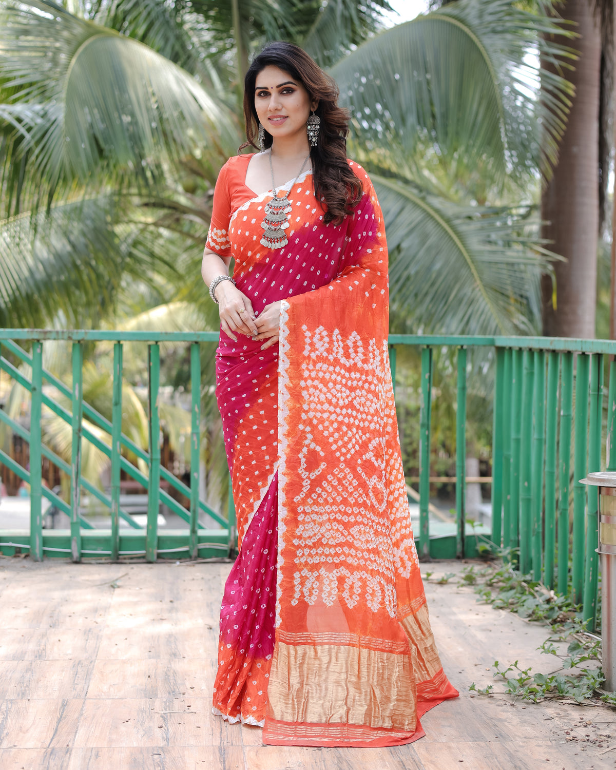 Premium Orange Pure Bandhej Silk Saree with Zari Weaving, Rich Tissue Pallu & Unstitched Blouse Piece.