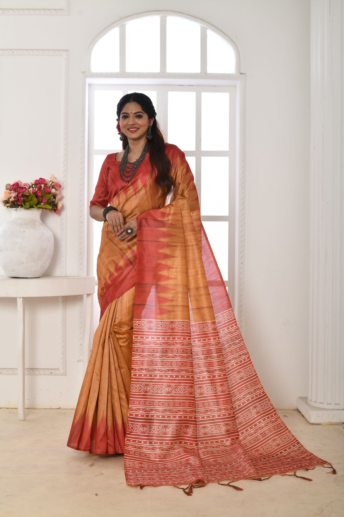 Orange Soft Tussar Silk Saree with Temple Border Print