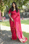 Luxurious Pink Bandhej Silk Saree with Zari Weaving and Rich Tissue Pallu – Elegant Bandhej Border & Matching Blouse.