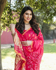 Luxurious Pink Bandhej Silk Saree with Zari Weaving and Rich Tissue Pallu – Elegant Bandhej Border & Matching Blouse.