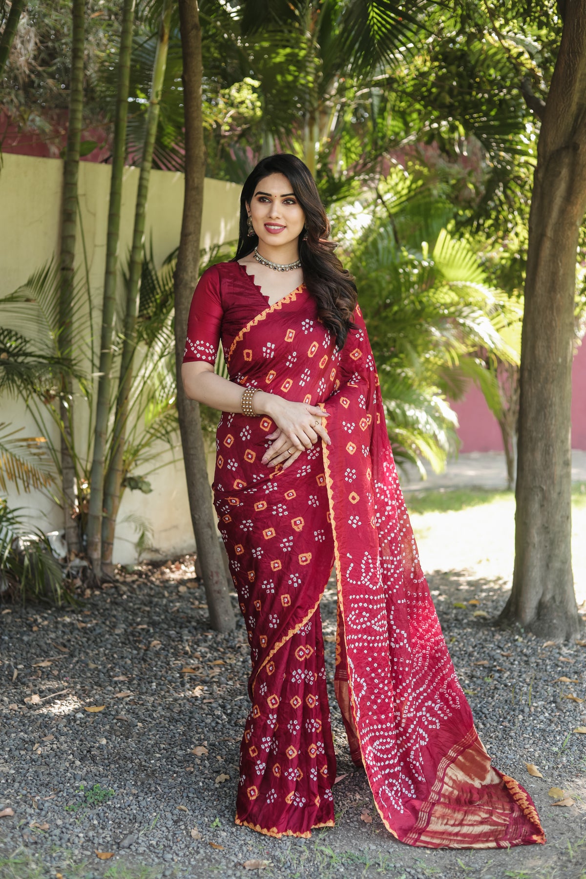 Luxurious Red Bandhej Silk Saree with Zari Weaving and Rich Tissue Pallu – Elegant Bandhej Border & Matching Blouse.