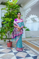 Sky Color Extraordinary Blend of Kanchipuram and Paithani Sarees: Soft Kanjivaram Silk with Exclusive Contrast Border & Rich Paithani Pallu.