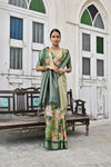 Premium Green Soft Bhagalpuri Silk Saree with Classic Pichwai Print Border, Contrast Pallu & Blouse Piece – Elegant Tassels.