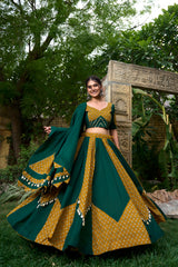 Green and Mustard Lehenga with Geometric Patterns and Tassel Detailing