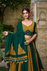 Green and Mustard Lehenga with Geometric Patterns and Tassel Detailing