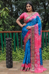 Luxurious Blue Dual Colour Bandhej Silk Saree with Zari Weaving and Broad Border – Soft, Lightweight, and Stylish.