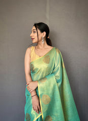 "Elegant Sea Green Tissue Silk Saree with Jacquard Zari Weaving - Rich Pallu, Jacquard Weaving Border, and Beautiful Motifs | 6.3 Meter Length with Blouse.