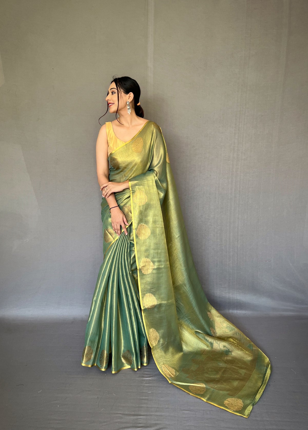 Elegant Dark Green Tissue Silk Saree with Jacquard Zari Weaving - Rich Pallu, Jacquard Weaving Border, and Beautiful Motifs | 6.3 Meter Length with Blouse.