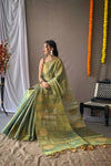 Original Green Tissue Silk Sarees with All-Over Zari Weaving and Mango Border - Chit Pallu with Jhalar, Paired with Zari Lining Unstitched Blouse.