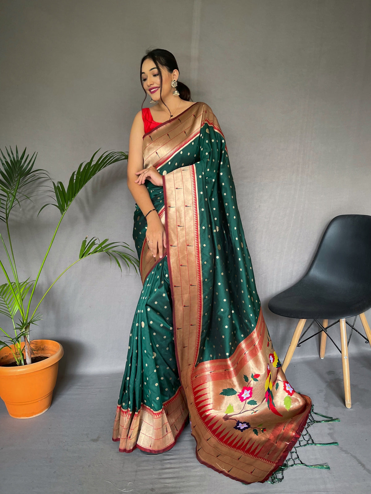 Green Pure Paithani Silk Saree with Rich Woven Pallu, Tassels, and Unique Motif Pattern – Includes Unstitched Blouse Piece.