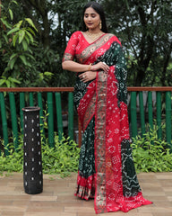 Luxurious Green Dual Colour Bandhej Silk Saree with Zari Weaving and Broad Border – Soft, Lightweight, and Stylish.