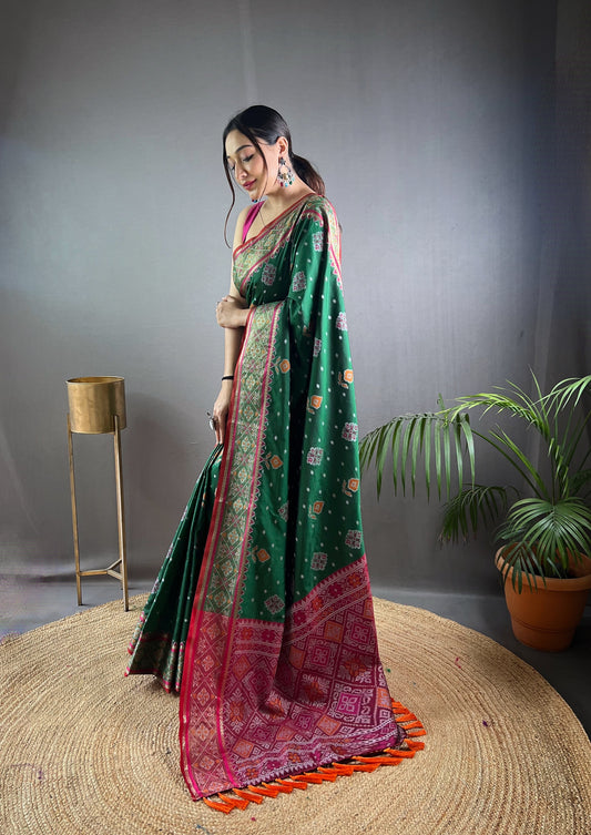 Green Color Soft Rangeen Patola Silk Saree with All-Over Meenakari Weaving | Rich Pallu with Tassels | Unstitched Blouse Piece Included.