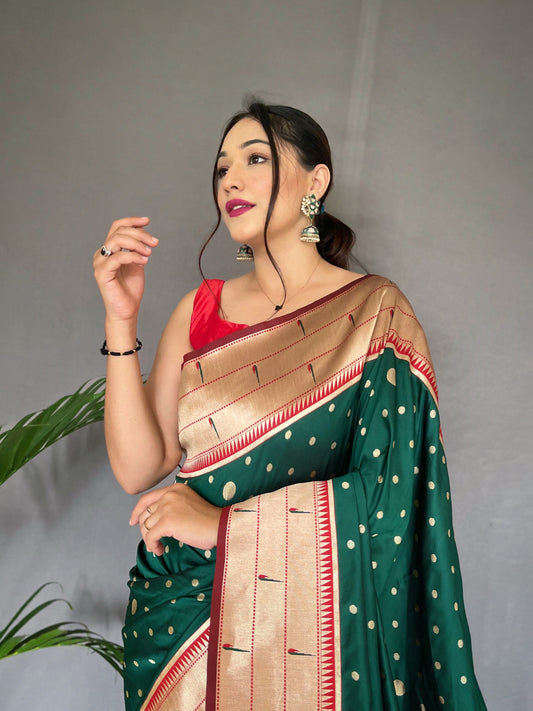 Green Pure Paithani Silk Saree with Rich Woven Pallu, Tassels, and Unique Motif Pattern – Includes Unstitched Blouse Piece.