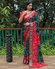 Luxurious Green Dual Colour Bandhej Silk Saree with Zari Weaving and Broad Border – Soft, Lightweight, and Stylish.