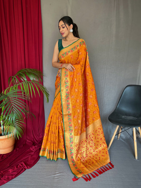 Pure Mustard Color Kachii Patola Silk Saree with All-Over Patola Weaving, Meenakari Border, Rich Pallu & Tassels with Unstitched Blouse Piece.